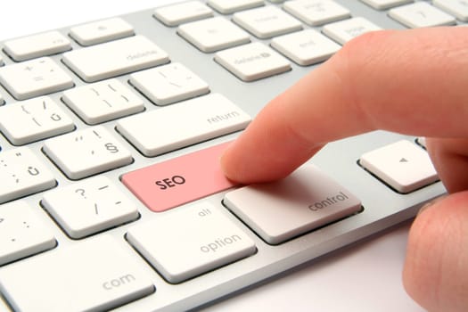 Search engine optimization concept - modernized computer keyboard with SEO keypad