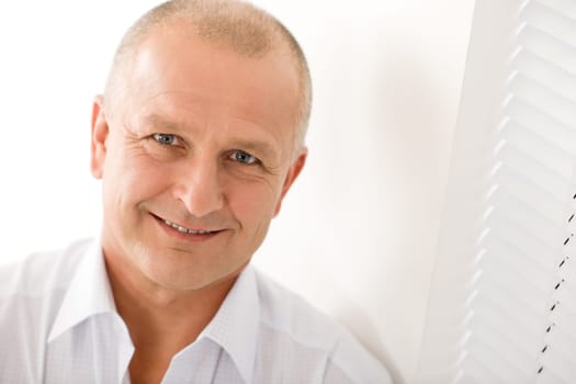Happy successful mature businessman professional close-up portrait smiling white background