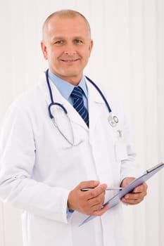 Professional senior doctor male with stethoscope portrait write document folders