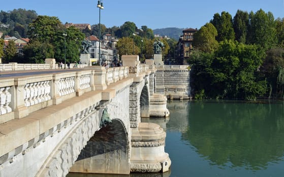 Turin, Italy - Bridge Umberto I on the river Po in a bright day
