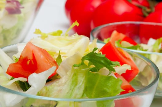 Closeup of Salad of Fresh Green Vegetables in Glass Bowl