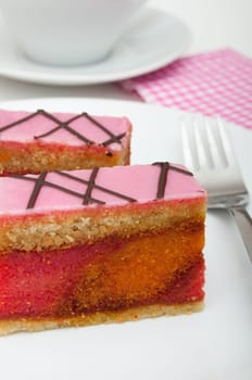 Punch Cake - Sweet Dessert on White Plate on Table