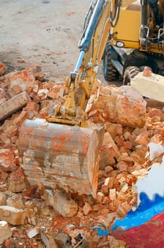 Detail of Digger in Building Under Demolition