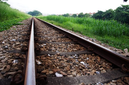 railway track with a vanishing point of view.
