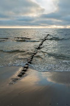 Stage in the Baltic Sea at sunrise