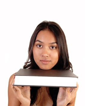 A lovely Asian girl holding a brown covered book under her chin, for white background.