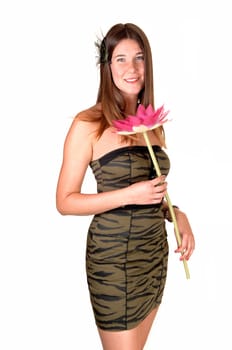 A pretty teenage girl in a strapless olive green tight dress with a pink flower in her hand and long dark blond hair, for white background.
