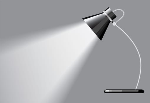 desk lamp with a grey background, with a empty space under spotlight.