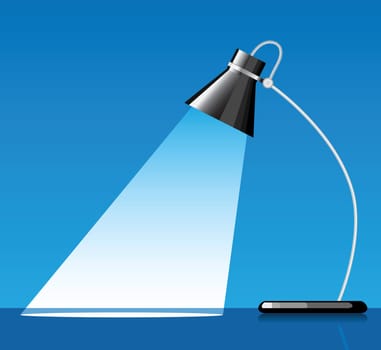 desk lamp with a blue background, with a empty space under spotlight.
