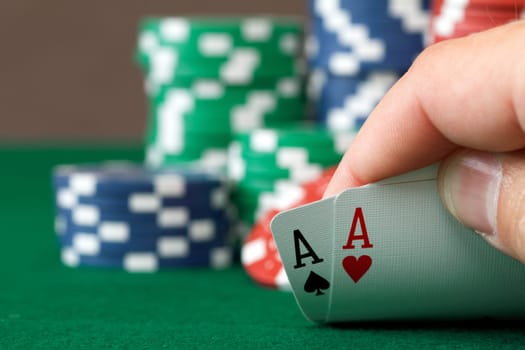 players hand, two aces