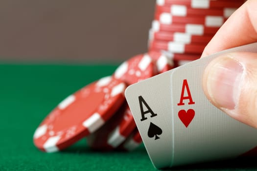 players hand, two aces