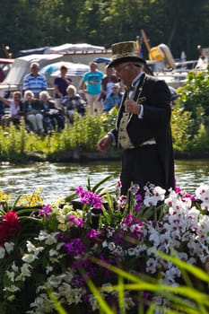 VLAARDINGEN - AUGUST 05: Each year this unique floating parade of beautiful decorated boats sail through the Westland. Theme this year: Theatre on water, August 05, 2011, Vlaardingen, the Netherlands
