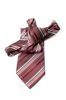 Red and green checkered man&#039 s necktie on white background