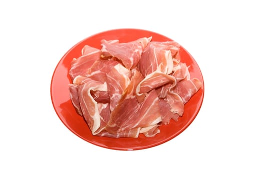 jamon at red dish on white background