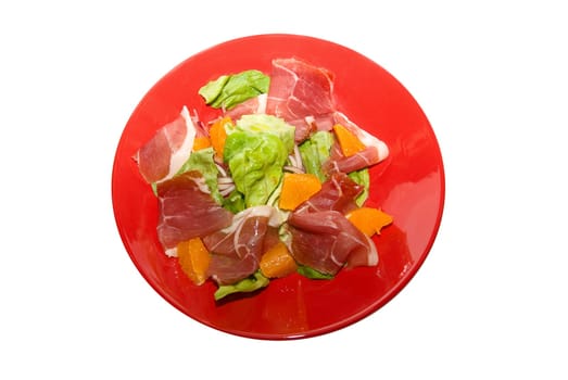 Salad: jamon with orange fruit and lettuce at red dish on white. It is very delicious.
