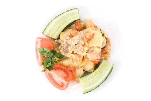 Top view of meat dish on white