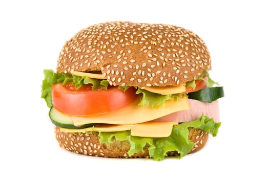 Hamburger with cheese tomatoes cucumbers and lettuce isolated on white
