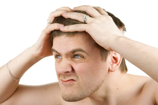 Portrait of a young man in pain on white