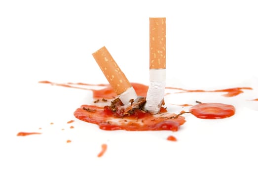 smoking kills concept. cigarettes with blood isolated on white.