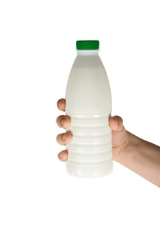Human hand holding bottle of milk isolated on white