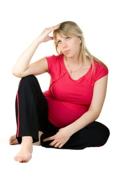 Pregnant thinking woman isolated on white background