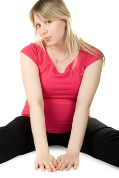 Happy pregnant sitting woman isolated on white background