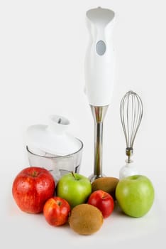 Blender with different ripe fruits ready for smoothie