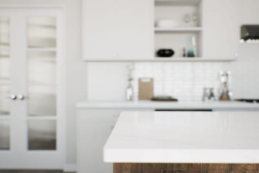 Focus on the marble countertop against the backdrop of kitchen appliances and utensils. Stylish traditional kitchen with wooden fixtures. 3D rendering