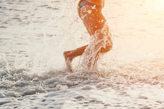 Running woman. Female runner jogging during the sunrise on beach. Woman Runner feet running on the beach at sunrise. woman fitness sunrise jog workout wellness concept.