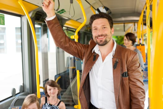 Male passenger on a bus