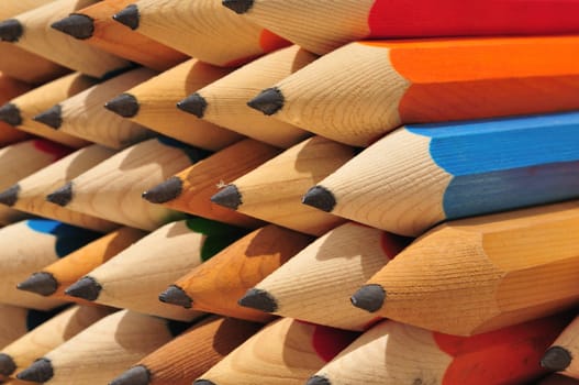 Macro-shot of large and wooden pencil tips. Focus on right side.