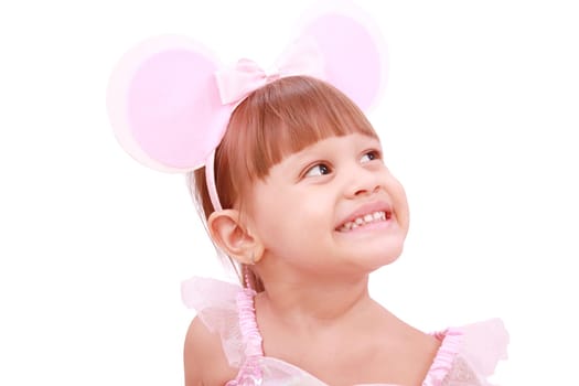 little girl wearing mouse`s ears laugh