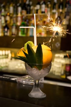Coctail with sparks at the bar counter
