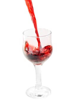 pouring red wine into glass isolated on white