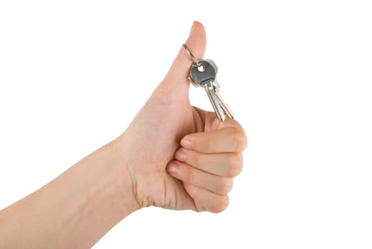 Silver key in a hand isolated on white background
