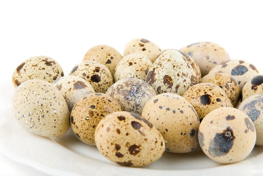delicatessen quail eggs isolated on white background