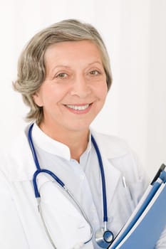 Smiling female doctor with stethoscope hold folders professional portrait