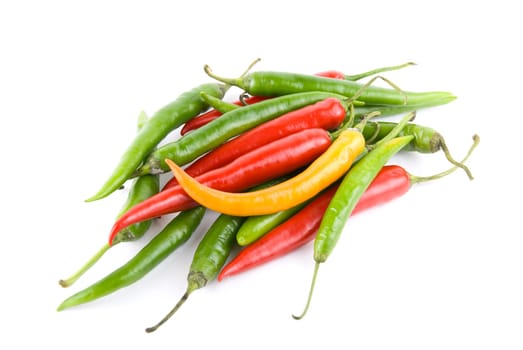 colored chili peppers isolated on white background