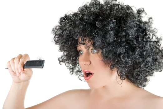 Beautiful young frizzy woman with hair at comb isolated over white background. Lost hair concept.