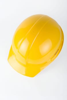Yellow helmet closeup on a white background