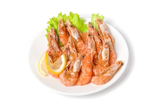 tasty shrimp with lemon and lettuce isolated on a white