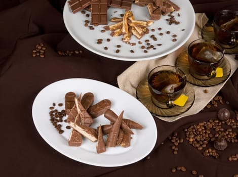 tea party set on dark brown background