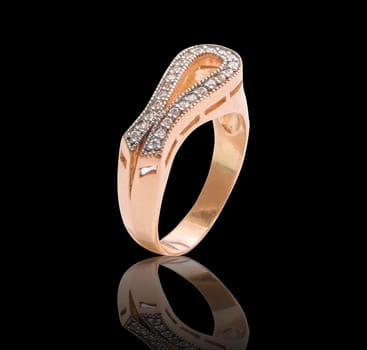 Beauty gold ring with diamond gems on black