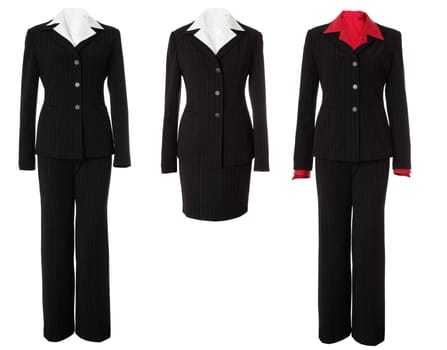 Empty classic business suits: jacket, trousers, skirt and shirt isolated over white background
