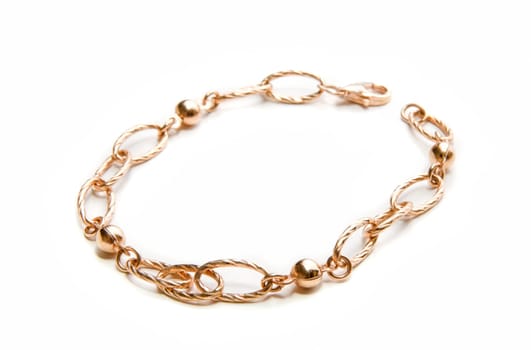 Beauty gold bangle on a white background