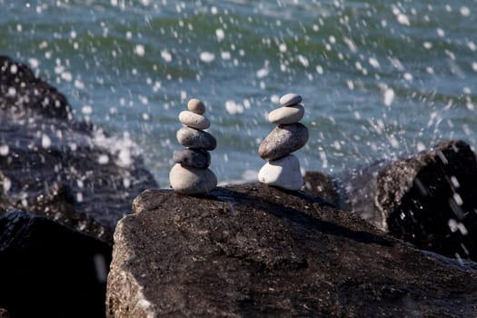 Two cairns by the sea