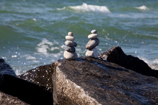 Two cairns by the sea