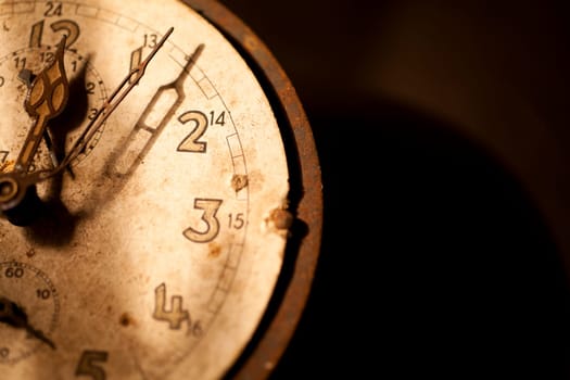 Old clock showing 5 to 12