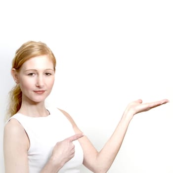 Pretty,cool woman presenting something - square