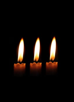 Glowing candle symbol of peace and happiness